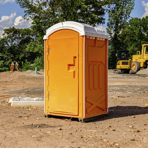 what is the cost difference between standard and deluxe portable restroom rentals in East Mead